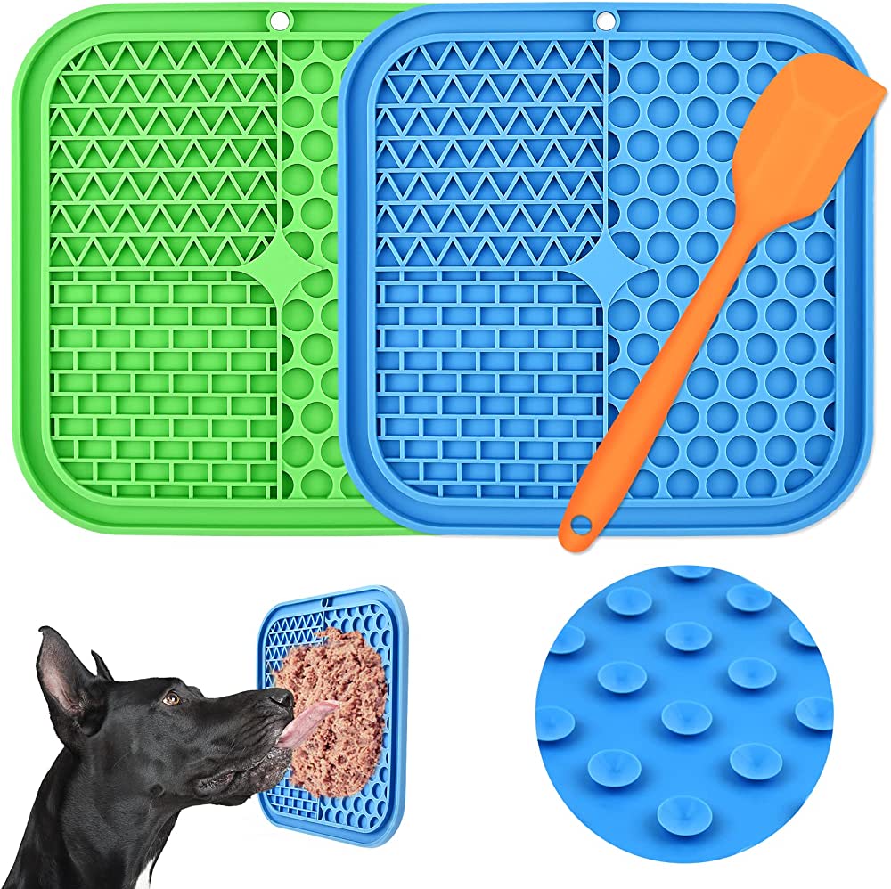 Blue and green lick mats with grooves for spreading yummy treats